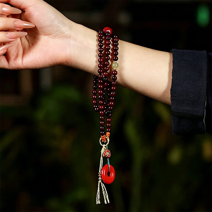Buddha Stones Mala di protezione con fibbia della pace in legno di sandalo rosso, intrecciata a mano con 108 perline. - image 7