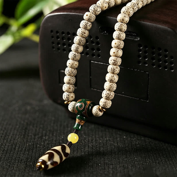 Buddha Stones Mala tibetano intrecciato a mano con 108 perle, composto da semi di Bodhi e stella, luna e pietra. - image 9