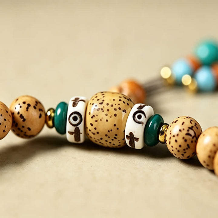 Buddha Stones Mala di saggezza artigianale con 108 perle, semi di Bodhi, baccelli di loto, stella, luna e baccello di saggezza. - image 15