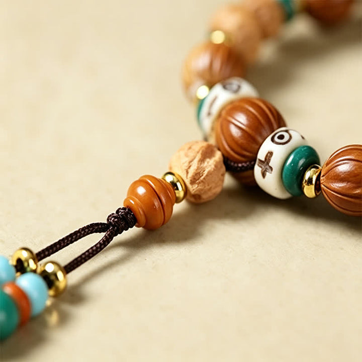 Buddha Stones Mala di saggezza artigianale con 108 perle, semi di Bodhi, baccelli di loto, stella, luna e baccello di saggezza. - image 16