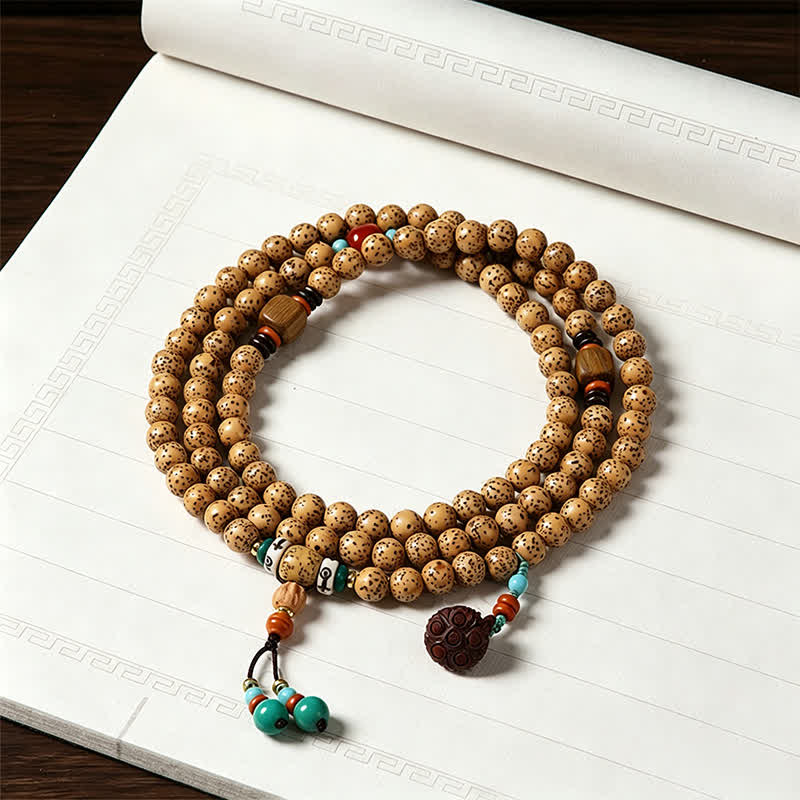 Buddha Stones Mala di saggezza artigianale con 108 perle, semi di Bodhi, baccelli di loto, stella, luna e baccello di saggezza. - Buddha (Compassione ♥ Serenità) - image 0