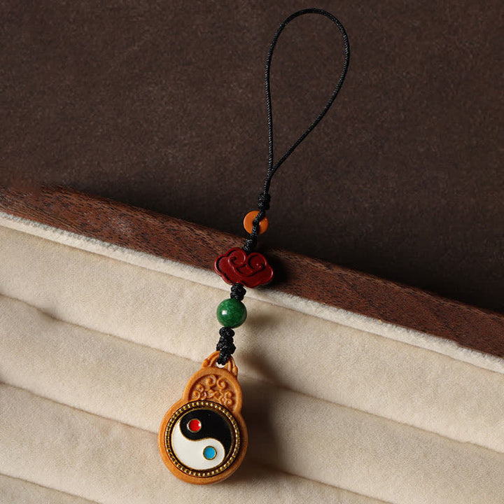 Buddha Stones Decorazione da appendere al telefono a forma di zucca con simbolo Yin Yang e legno di sandalo verde Bagua. - image 3