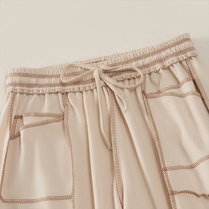 Pantaloni da donna a gamba dritta con tasche, stile casual estivo, minimalisti, con coulisse e tasche applicate, colore tinta unita, con Buddha Stones. - image 2