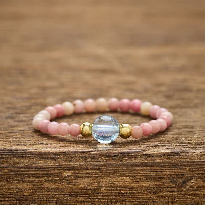 Buddha Stones Anello elastico curativo con mini perline da 2 mm in rodonite naturale, acquamarina, topazio e quarzo rosa. - Rodonite naturale (il colore può variare) + Acquamarina naturale (il colore può variare) (2 mm + 4 mm) - image 0