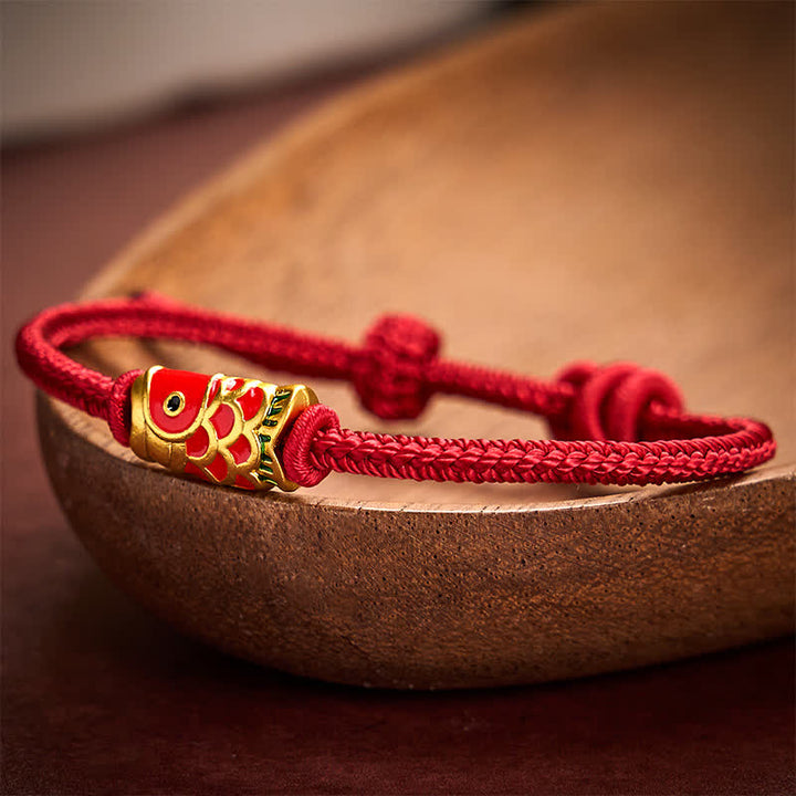 Buddha Stones Braccialetto intrecciato a mano con filo rosso e motivo a carpe koi, regolabile in resistenza. - image 1