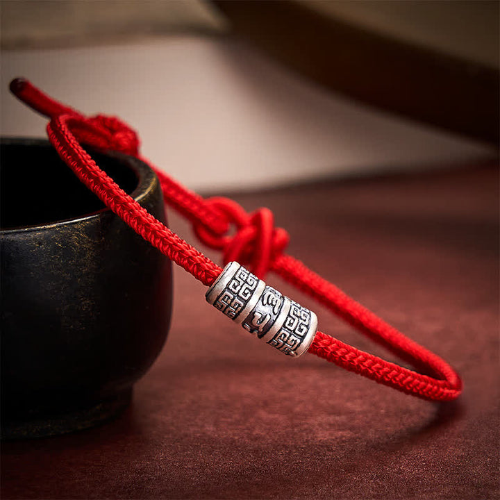Buddha Stones Braccialetto di protezione Om Mani Padme Hum in corda rossa intrecciata a mano. - image 1