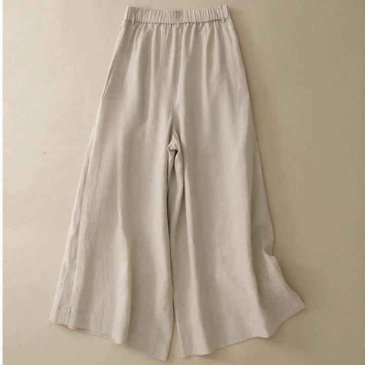 Pantaloni da donna a gamba larga con tasche, eleganti e casual estivi, in cotone ramie tinta unita, con bottoni e stampa Buddha Stones. - image 1