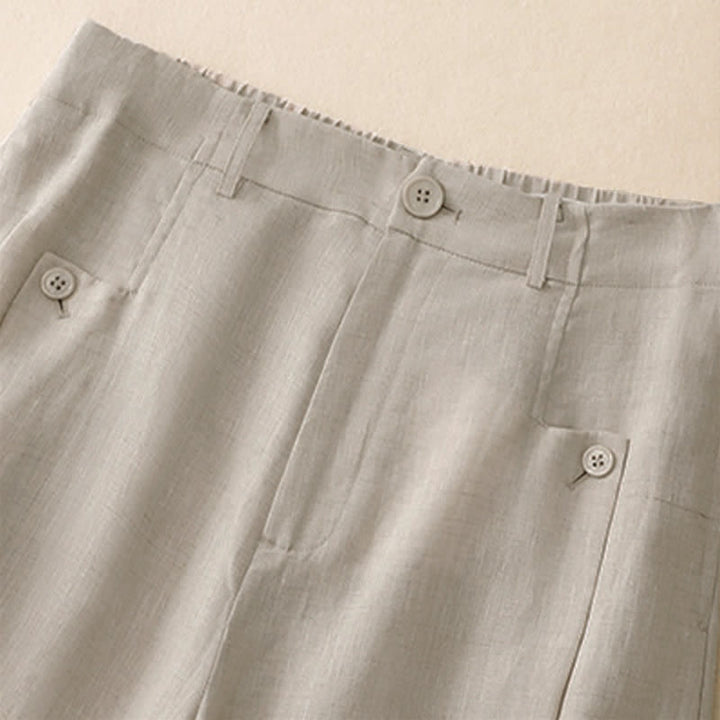 Pantaloni da donna a gamba larga con tasche, eleganti e casual estivi, in cotone ramie tinta unita, con bottoni e stampa Buddha Stones. - image 2