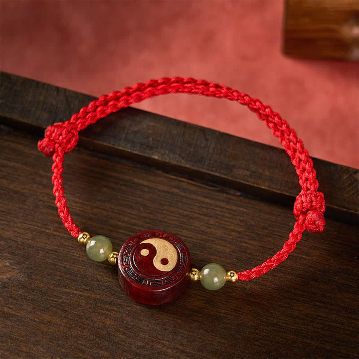 Buddha Stones Braccialetto rosso con cordino rosso e giada di sandalo viola e simbolo Yin Yang. - image 1