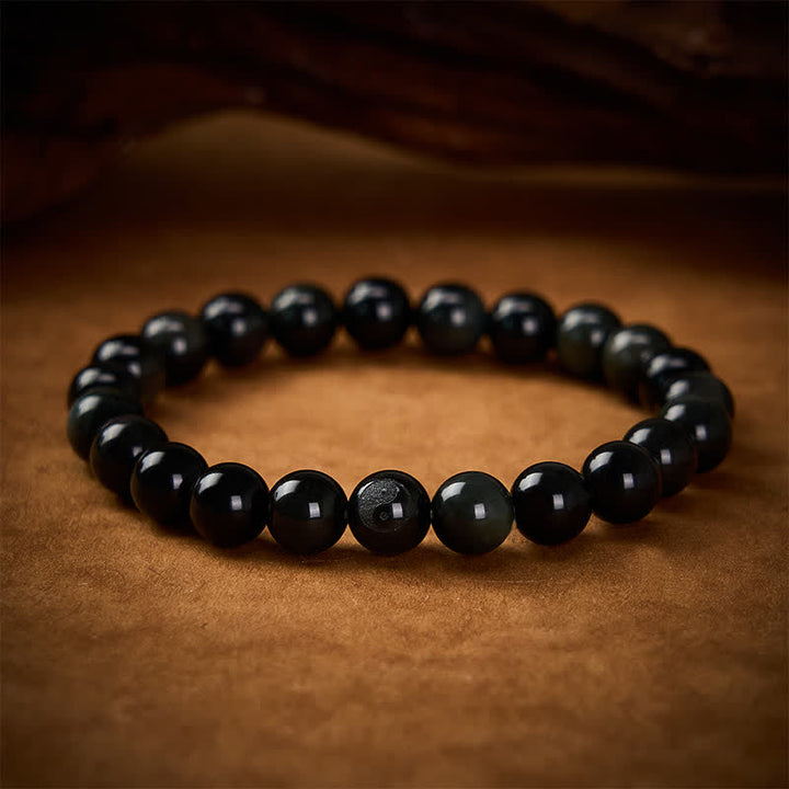 Buddha Stones Bracciale con perline rotonde in ossidiana arcobaleno con simbolo Yin Yang e bilancia - Ossidiana arcobaleno (cambia colore a seconda della luce) - 8 mm - image 0