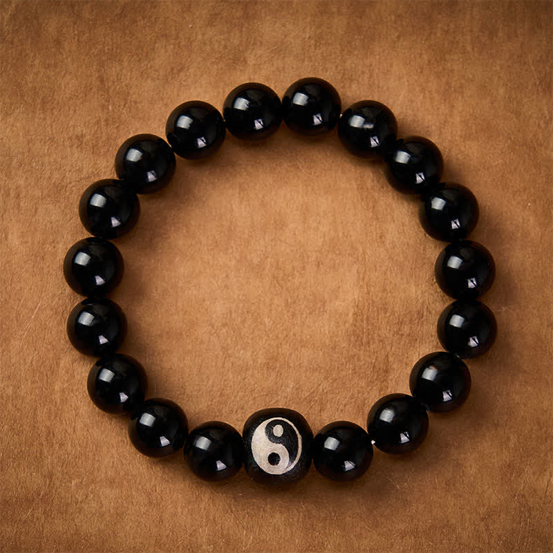 Buddha Stones Bracciale protettivo con perline Yin Yang in ossidiana nera tibetana e onice nera, con simbolo Yin Yang. - image 1