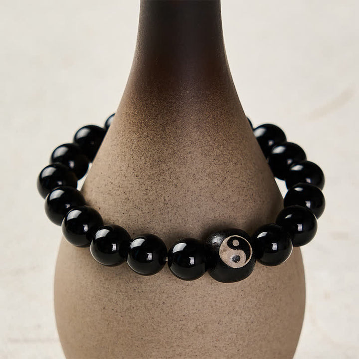 Buddha Stones Bracciale protettivo con perline Yin Yang in ossidiana nera tibetana e onice nera, con simbolo Yin Yang. - image 4