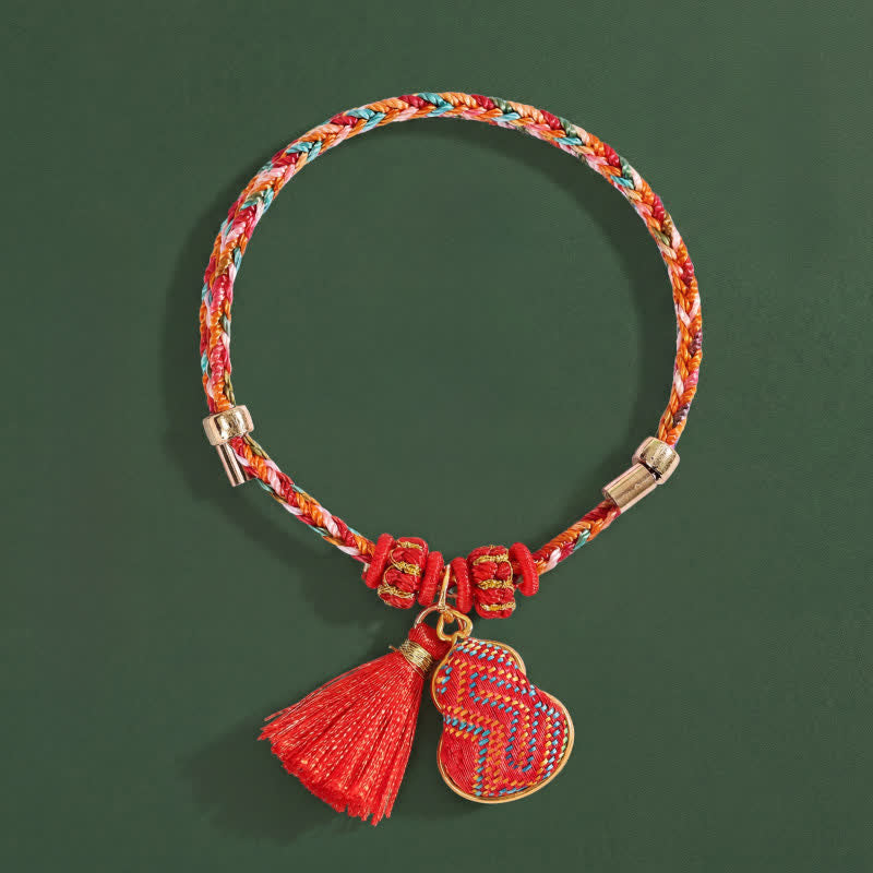 Buddha Stones Bracciale di protezione a forma di zucca in broccato con cordino rosso a cinque colori. - Rosso (stessa tonalità di colore – la fantasia può variare) - image 0