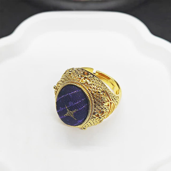 Buddha Stones Anello regolabile ovale in stile cinese Song Brocade Prosperity color uovo di piccione. - image 1