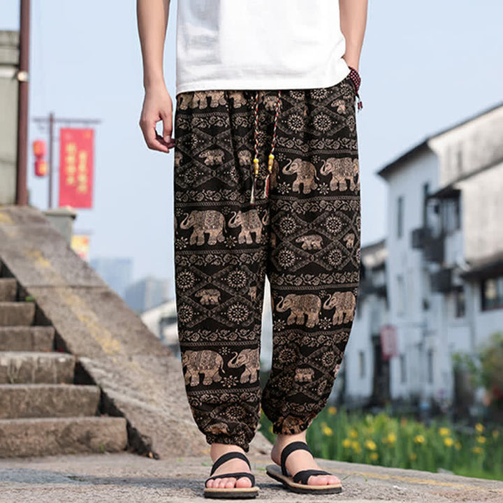 Buddha Stones Pantaloni corti da uomo estivi in ​​stile boho casual con coulisse, stampa di elefanti e alberi, modello harem con tasche. - image 1