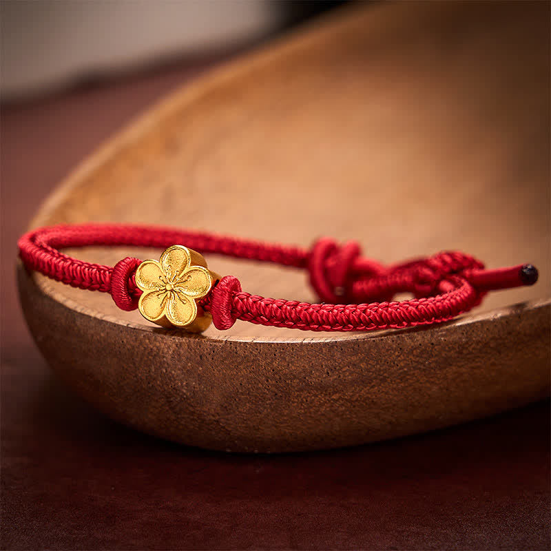 Buddha Stones Braccialetto portafortuna con cordino intrecciato a mano in filo rosso e fiore di pesco. - image 2