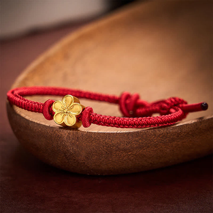 Buddha Stones Braccialetto portafortuna con cordino intrecciato a mano in filo rosso e fiore di pesco. - image 2