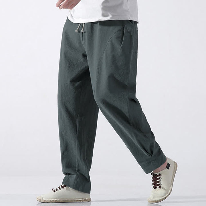 Buddha Stones Pantaloni corti da uomo estivi casual e minimalisti in cotone tinta unita con coulisse, modello harem con tasca. - image 1