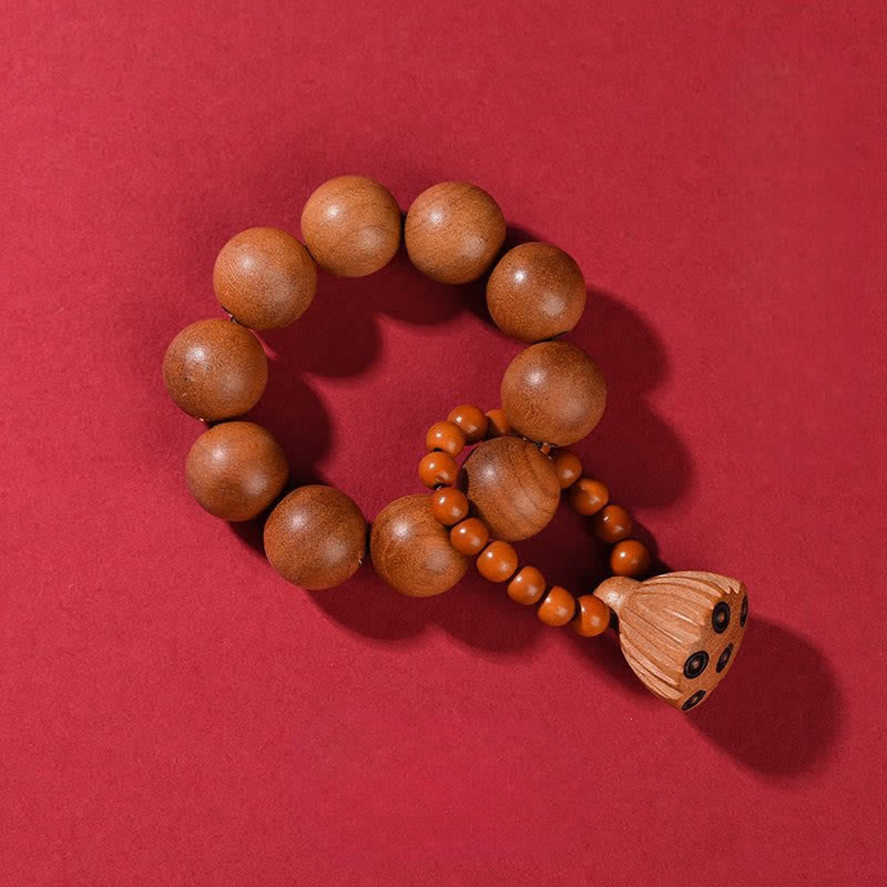 Buddha Stones Perline decorative tattili in legno di pesco a forma di baccello di loto, lucidate a mano, ideali per la meditazione e il radicamento. - Legno di pesco (Protezione ♥ Purificazione) - image 1