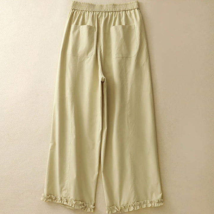 Buddha Stones Pantaloni harem da donna estivi casual ed eleganti con bottoni, cerniera, orlo a balze e tasca. - image 1