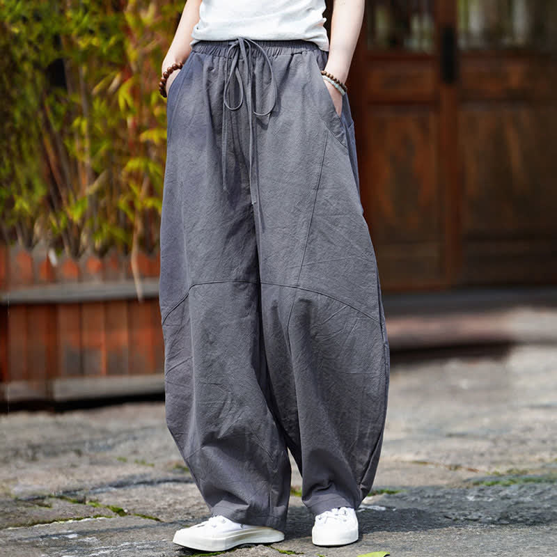 Buddha Stones Pantaloni corti estivi casual da uomo in cotone tinta unita con coulisse, modello harem con tasca - image 1