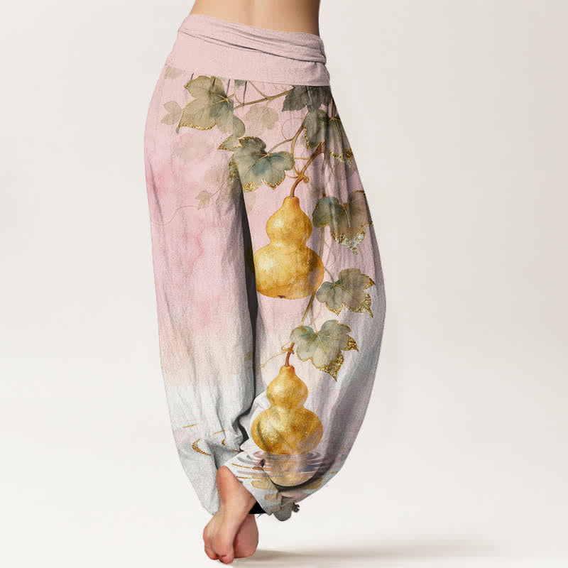 Buddha Stones Pantaloni harem da donna in cotone con motivo a foglie di zucca dorata e elastico in vita. - image 1