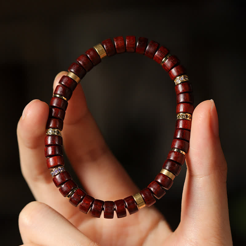 Buddha Stones Bracciale minimalista con perline a barilotto in legno di palissandro rosso e ebano. - image 4