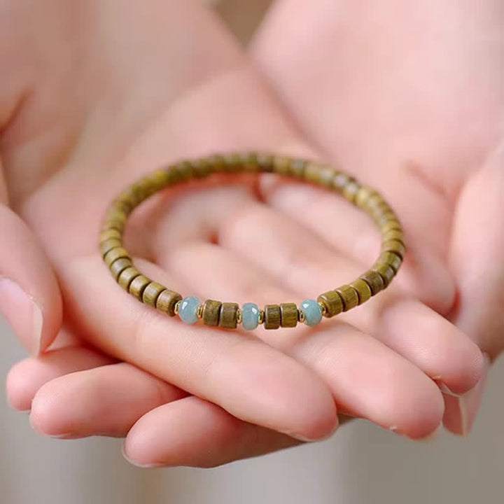 Buddha Stones Bracciale a barilotto con perline in giada e sandalo verde, colore Serenity. - image 2