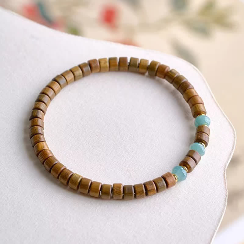 Buddha Stones Bracciale a barilotto con perline in giada e sandalo verde, colore Serenity. - image 1