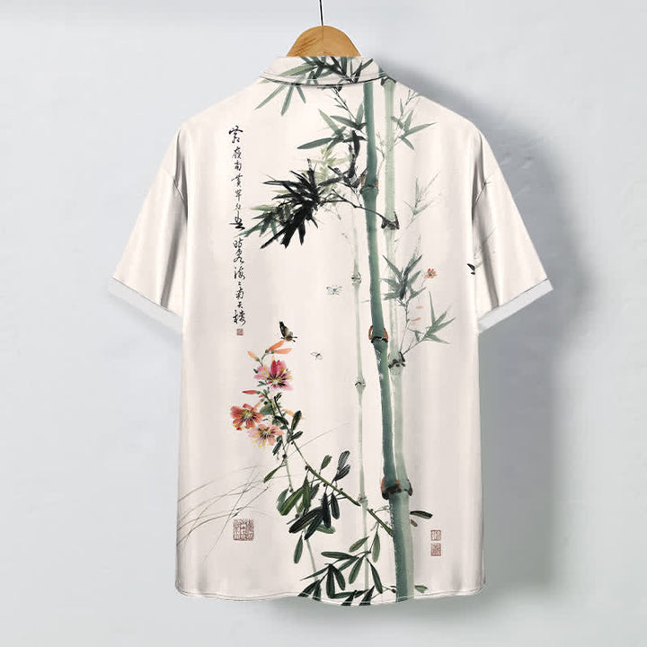 Buddha Stones Camicia da uomo a maniche corte traspirante con motivo calligrafico di uccelli e fiori di bambù, stampa a inchiostro, inchiostro e calligrafia, bottoni. - image 1