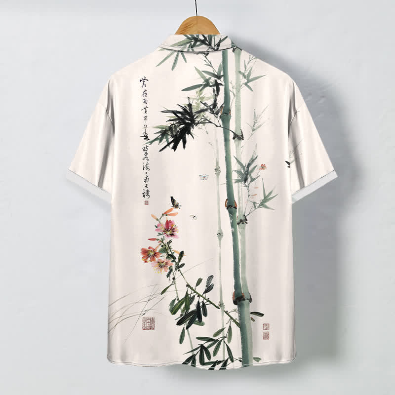 Buddha Stones Camicia da uomo a maniche corte traspirante con motivo calligrafico di uccelli e fiori di bambù, stampa a inchiostro, inchiostro e calligrafia, bottoni. - image 1