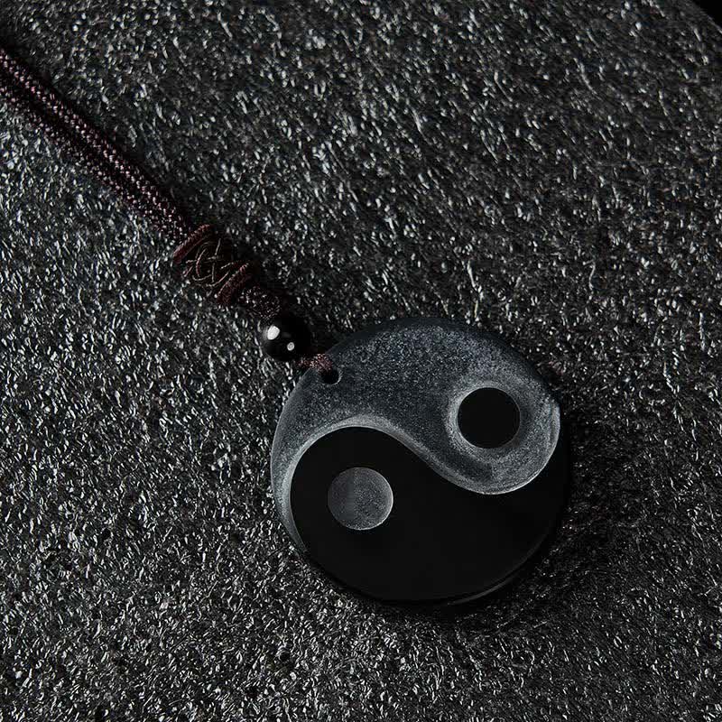 Buddha Stones Collana con ciondolo rotondo in ossidiana nera a forma di Yin Yang ed equilibrio. - image 1