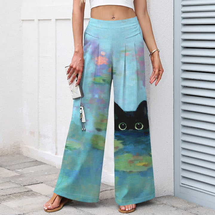 Buddha Stones Pantaloni da donna a gamba larga con elastico in vita e tasche, in cotone e lino, con stampa di un simpatico gatto nero e laghetto di loto. - image 1