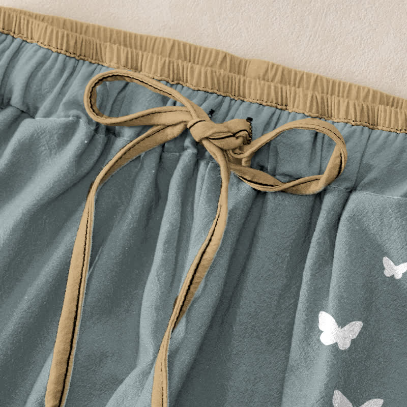 Buddha Stones Pantaloni da donna in puro cotone bianco con fantasia a farfalle, elastico in vita e tasche. - image 1