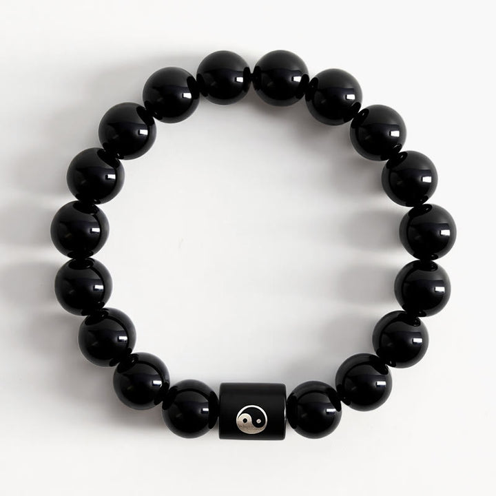 Buddha Stones Bracciale in legno di ebano con perline a barilotto intarsiate a simbolo Yin Yang e bilanciamento Yin Yang. - image 1
