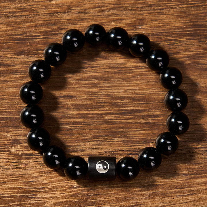 Buddha Stones Bracciale in legno di ebano con perline a barilotto intarsiate a simbolo Yin Yang e bilanciamento Yin Yang. - image 2