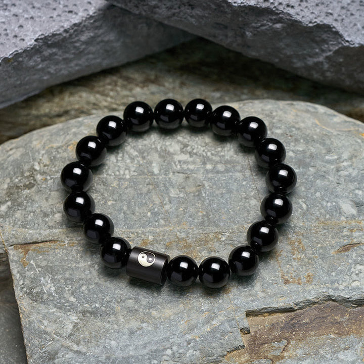 Buddha Stones Bracciale in legno di ebano con perline a barilotto intarsiate a simbolo Yin Yang e bilanciamento Yin Yang. - image 3