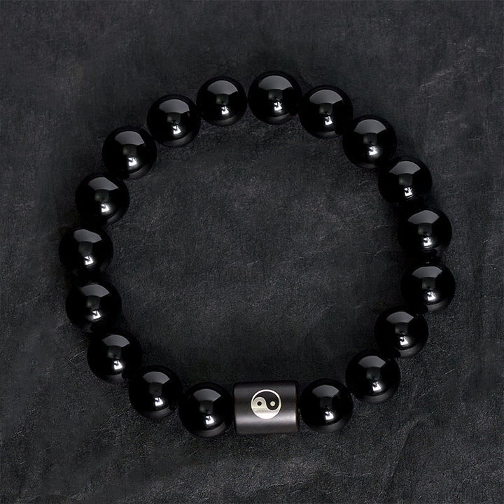 Buddha Stones Bracciale in legno di ebano con perline a barilotto intarsiate a simbolo Yin Yang e bilanciamento Yin Yang. - image 4