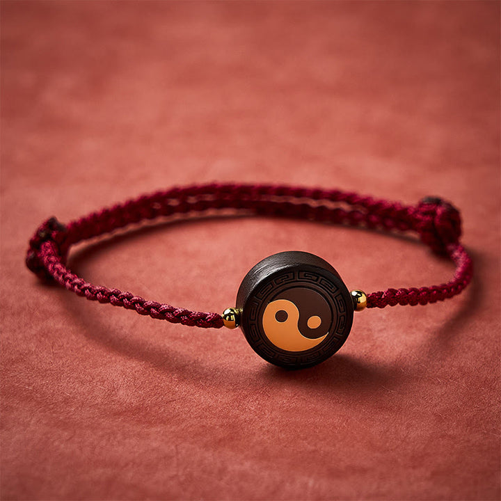 Buddha Stones Braccialetto Bagua in legno d'ebano con cordino rosso per radicamento. - image 2
