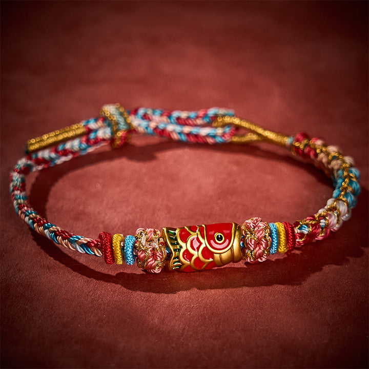 Buddha Stones Braccialetto con corda intrecciata a mano con fiori di pesco e pesci koi, simbolo di successo. - image 1