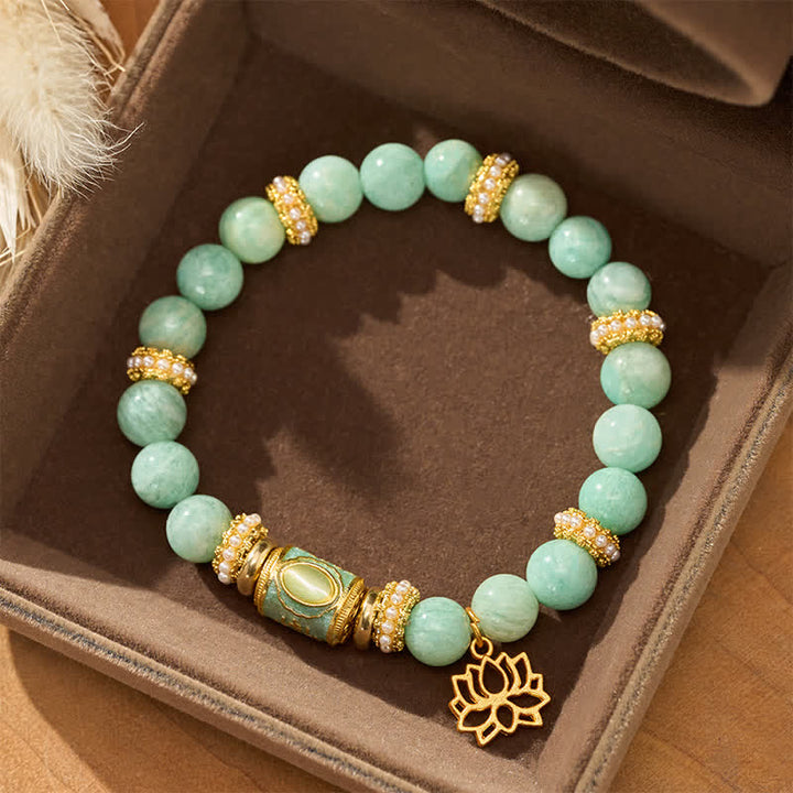 Buddha StonesCiondolo a forma di loto con perla a barilotto in amazzonite smaltata, bracciale con perle rotonde lucidate a mano. - image 1