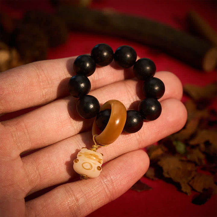 Buddha Stones Decorazioni tattili per la meditazione con perline a forma di gatto e orso in legno di ebano, grigliate a carbone. - Gatto - Legno d'ebano (Equilibrio♥Calma) - image 0