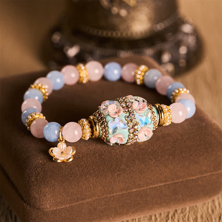 Buddha Stones Bracciale con ciondolo a forma di fiore in quarzo rosa, calcedonio blu e perline rotonde in rame, con perline a barilotto e perline Love. - Calcedonio blu quarzo rosa (circonferenza del polso: 15–16 cm) - image 0