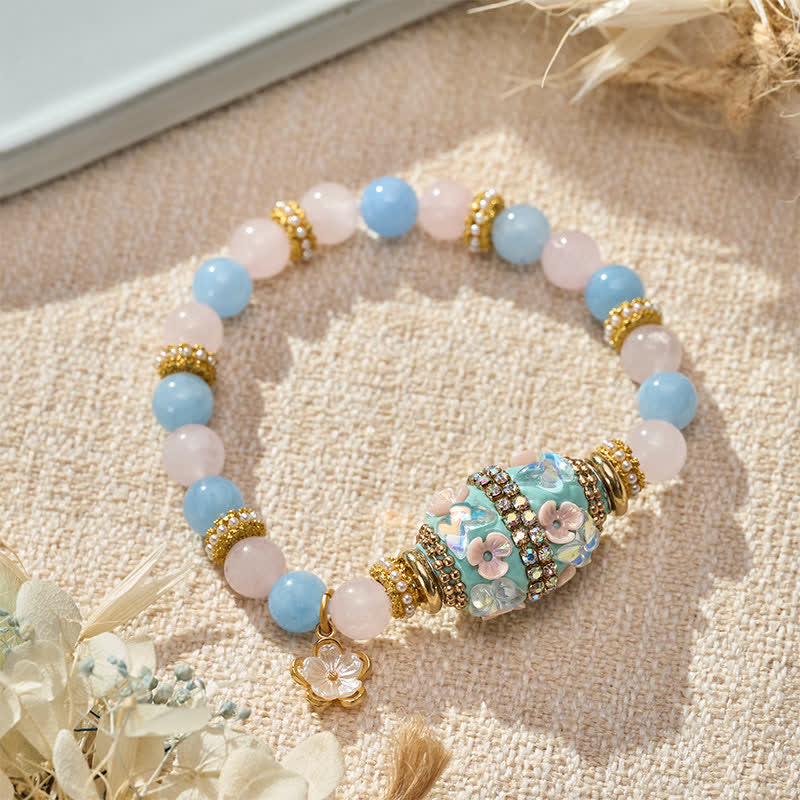 Buddha Stones Bracciale con ciondolo a forma di fiore in quarzo rosa, calcedonio blu e perline rotonde in rame, con perline a barilotto e perline Love. - image 1