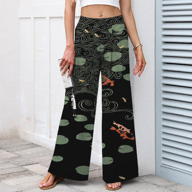 Buddha Stones Pantaloni da donna a gamba larga con elastico in vita e tasche, in cotone e lino, con stampa a onde di foglie di loto e pesci koi. - image 1