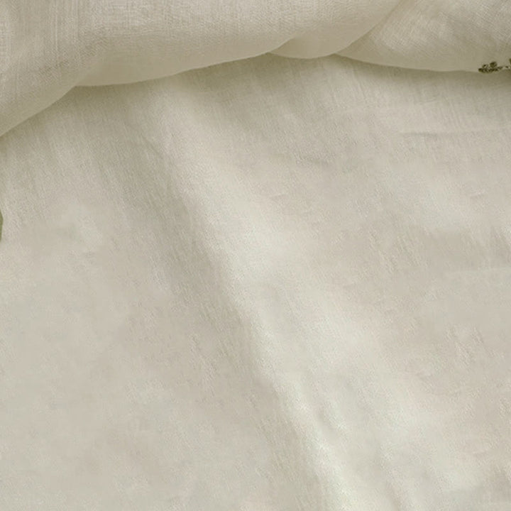 Camicia da donna a maniche a tre quarti con scollo rotondo e ricamo floreale a foglie verdi, colore beige Buddha Stones. - image 9