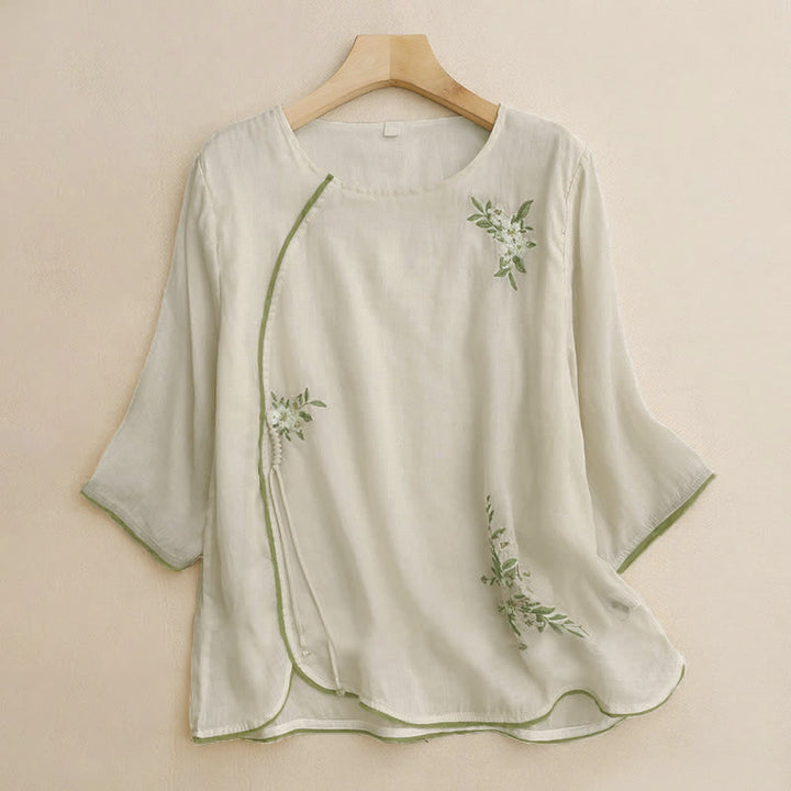 Camicia da donna a maniche a tre quarti con scollo rotondo e ricamo floreale a foglie verdi, colore beige Buddha Stones. - Beige - US12, UK/AU16, EU44 (2XL) - image 0