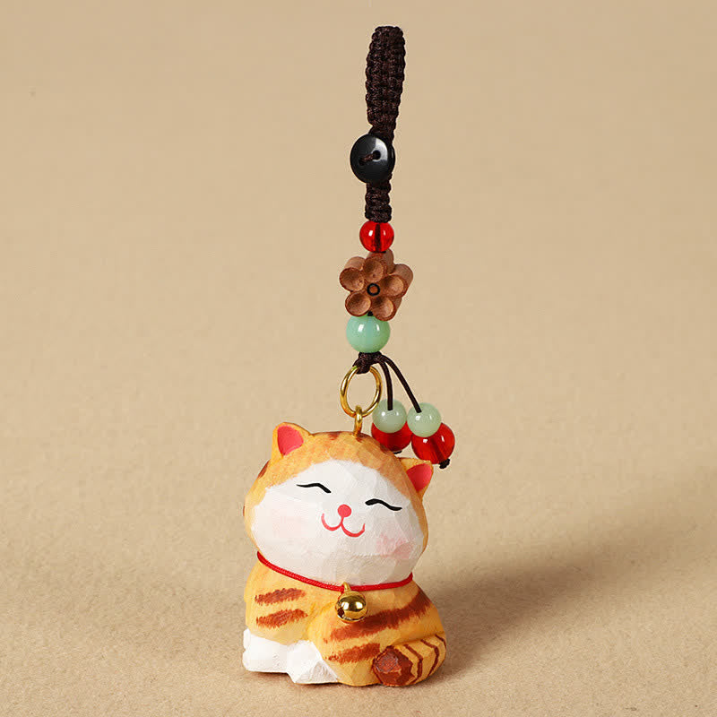 Buddha Stones Portachiavi in ​​legno intagliato con gatto, Om Mani, Padme, Hum e Focus - image 1