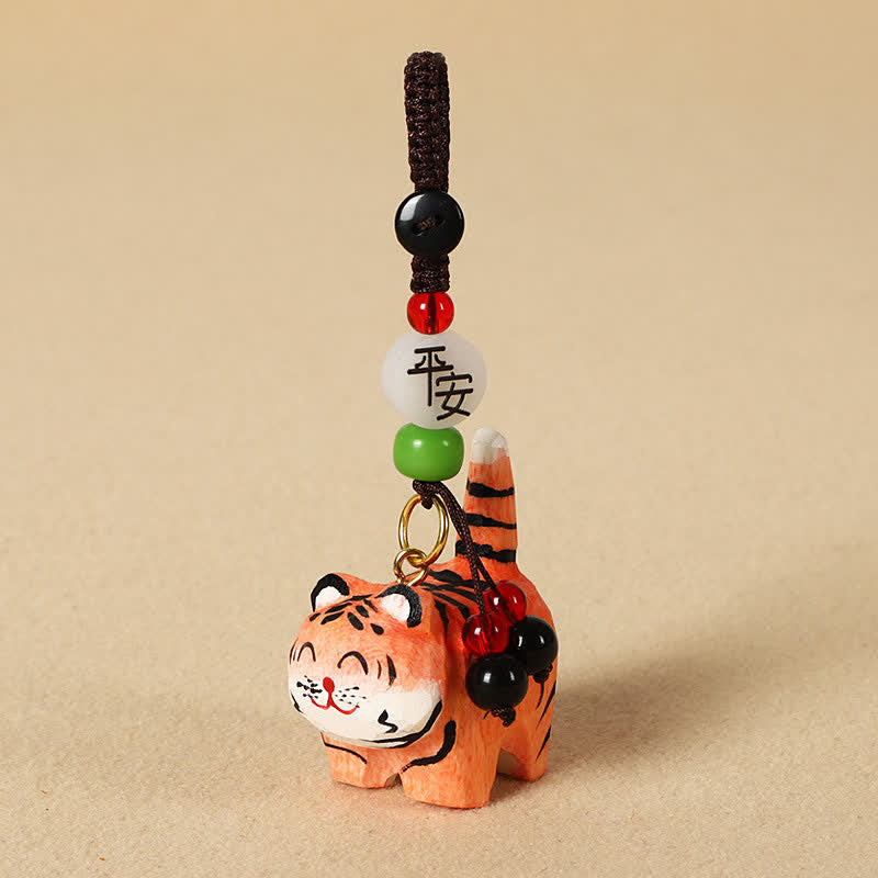 Buddha Stones Portachiavi in ​​legno intagliato con tigre, Om Mani, Padme, Hum e Focus - Tigre sicura - image 1