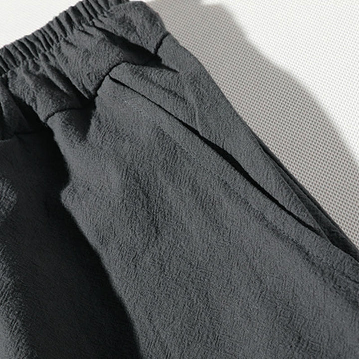 Set di abbigliamento da meditazione da uomo con motivo Buddha Stones , composto da t-shirt semplice con colletto a revers e pantaloncini a gamba larga con tasche. - image 13